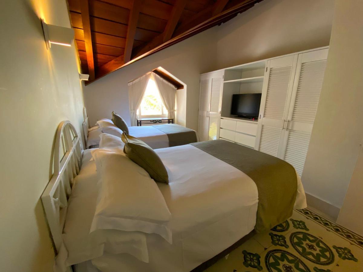 Hotel Las Americas Casa De Playa Cartagena Exterior photo A room at the hotel