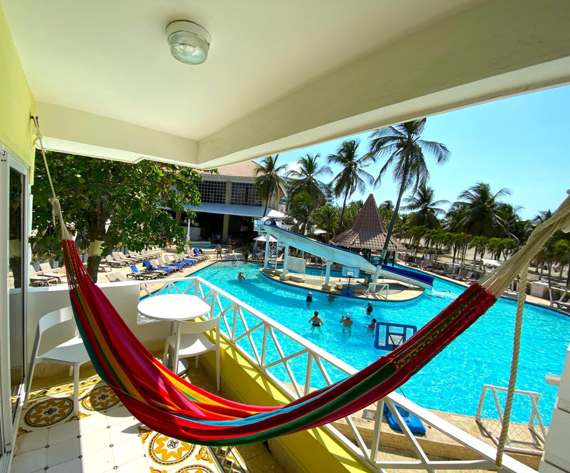 Hotel Las Americas Casa De Playa Cartagena Exterior photo Hammock on a balcony
